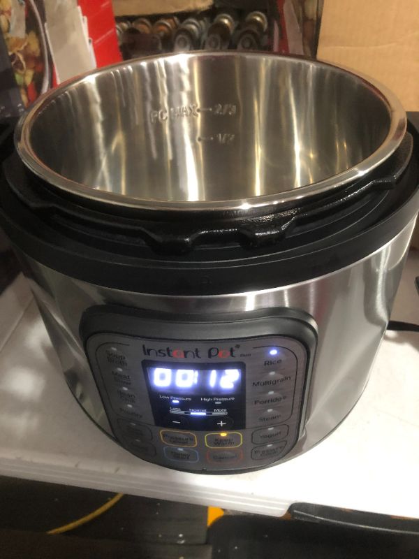 Photo 4 of **LARGE DENTS AROUND CONTROL PANEL** Instant Pot Duo 7-in-1 Electric Pressure Cooker, Stainless Steel, 8 Quart 8QT Duo **SEE NOTES**