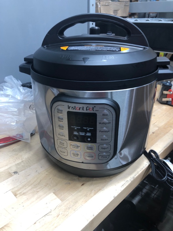 Photo 3 of **LARGE DENTS AROUND CONTROL PANEL** Instant Pot Duo 7-in-1 Electric Pressure Cooker, Stainless Steel, 8 Quart 8QT Duo **SEE NOTES**