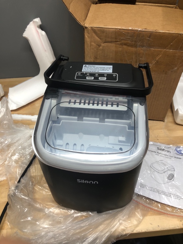 Photo 2 of 
Item is Black***Silonn Countertop Ice Maker Machine with Handle, Portable Makers Countertop, Makes up to 27 lbs. of Per Day, 9 Cubes in 7 Mins, Self-Cleaning Scoop and...