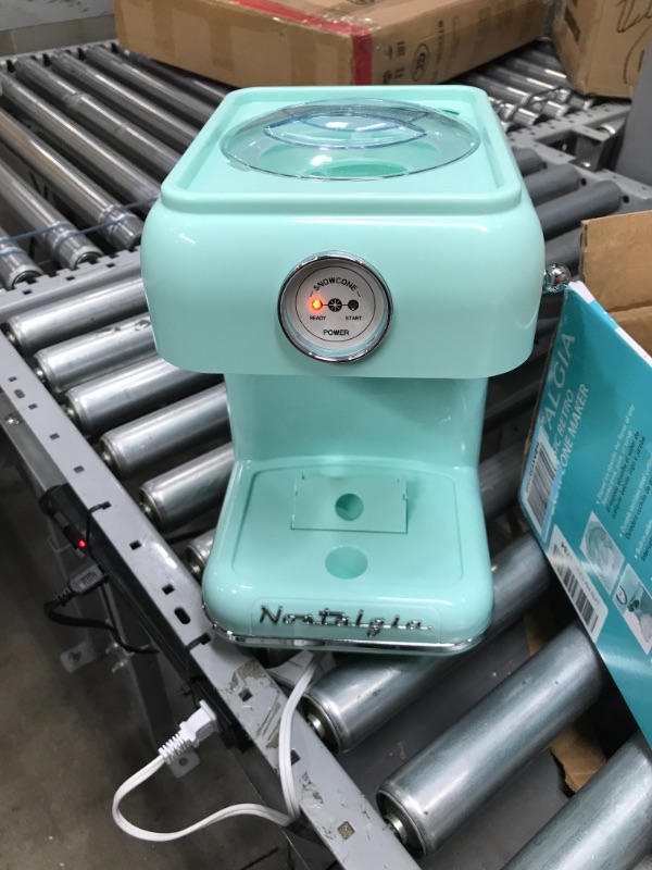 Photo 3 of **FOR PARTS OR REPAIR**
Nostalgia Retro Table-Top Snow Cone Maker, Vintage Shaved Ice Machine Includes 1 Reusable Plastic Cup, Aqua