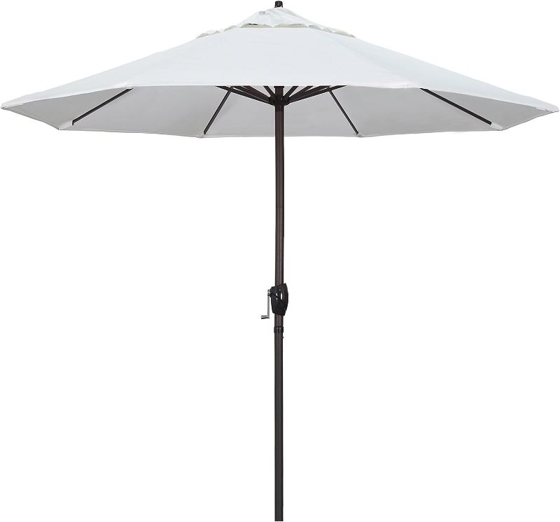 Photo 1 of 
California Umbrella 9' Round Aluminum Market Umbrella, Crank Lift, Auto Tilt, Bronze Pole, White Olefin
Color:White