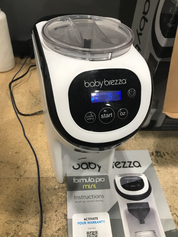 Photo 2 of Baby Brezza Formula Pro Mini Baby Formula Maker – Small Baby Formula Mixer Machine Fits Small Spaces and is Portable for Travel– Bottle Makers Makes The Perfect Bottle for Your Infant On The Go Formula Pro Mini Dispenser Machine