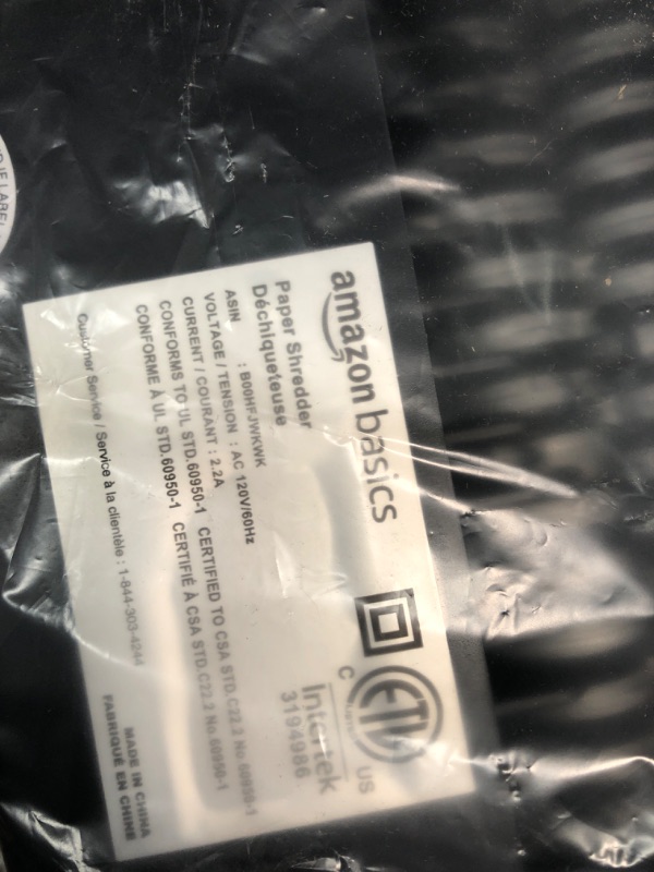 Photo 1 of Amazon Basics 6-Sheet Cross-Cut Paper Shredder and Shredder Sharpening & Lubricant Sheets (Pack of 24) Bundle