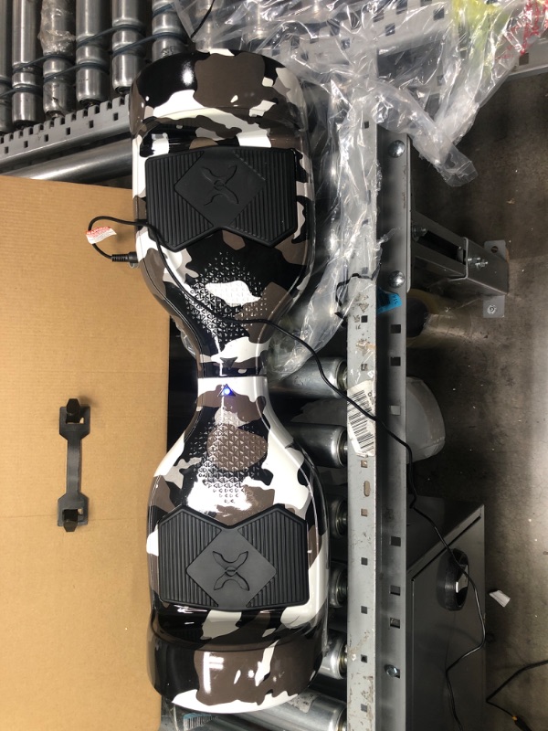 Photo 2 of Hover-1 Helix Electric Hoverboard | 7MPH Top Speed, 4 Mile Range, 6HR Full-Charge, Built-in Bluetooth Speaker, Rider Modes: Beginner to Expert Hoverboard Camo