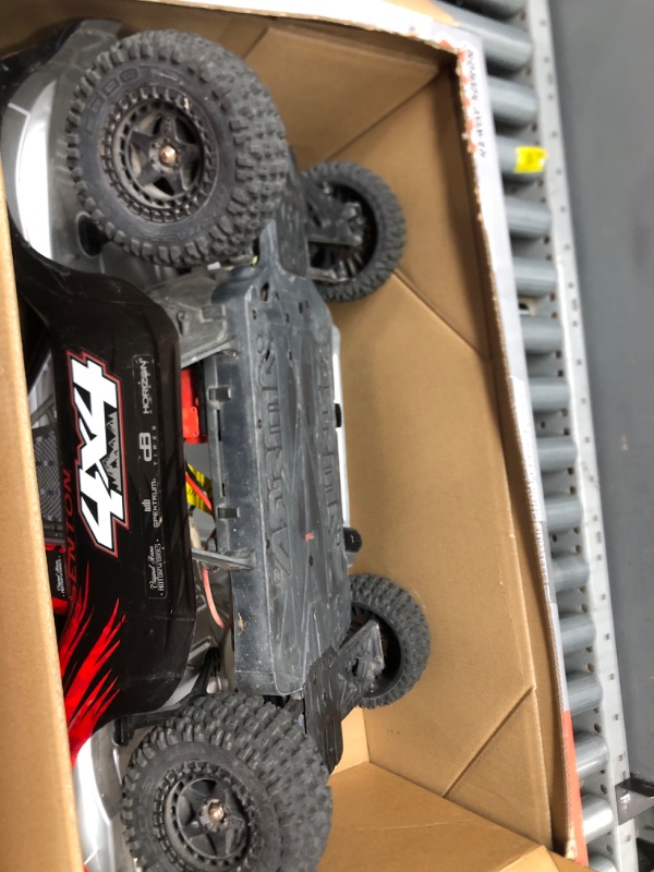 Photo 3 of 
***OPENED BOX USED MAYBE  MISSINGHARDWARE***

 ARRMA 1/10 SENTON 4X4 V3 MEGA 550 Brushed Short Course RC Truck RTR (Transmitter, Receiver, NiMH Battery and Charger Included), Red, ARA4203V3T1