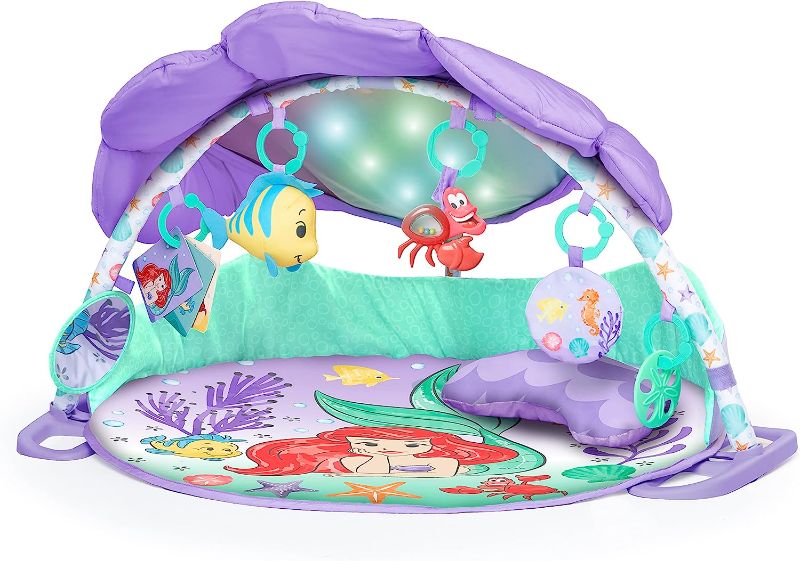 Photo 1 of Bright Starts The Little Mermaid Twinkle Trove Light-Up Musical Baby Activity Gym with Tummy Time Pillow, Newborn+

