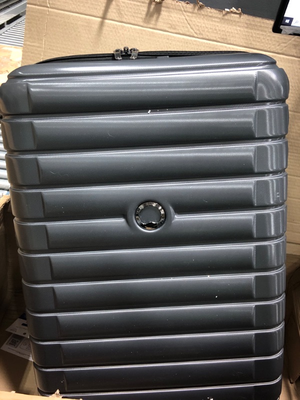 Photo 2 of "missing wheel" DELSEY Paris Cruise 3.0 Hardside Expandable Luggage with Spinner Wheels, Graphite, Checked-Large 28 Inch
