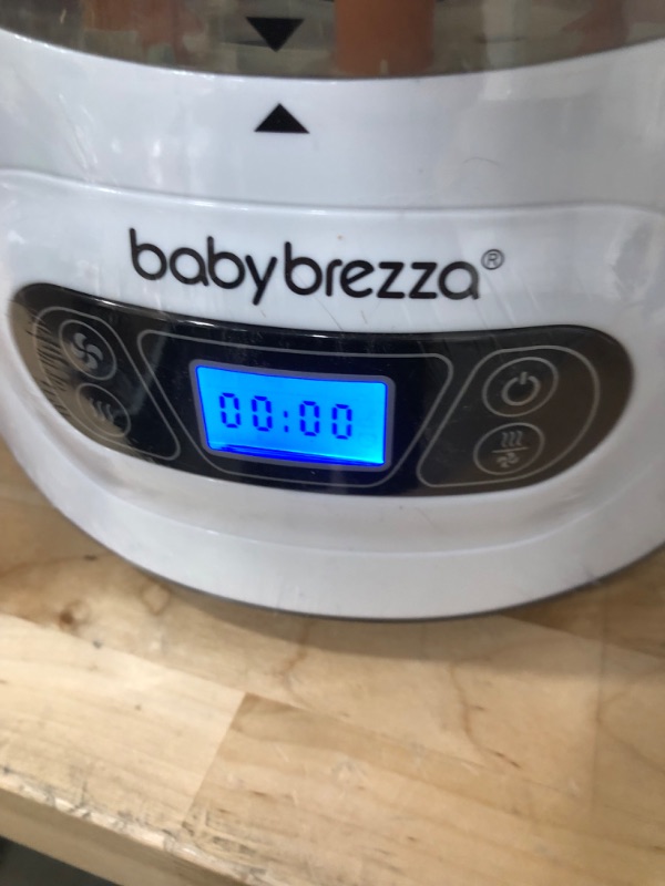 Photo 2 of Baby Brezza Baby Bottle Sterilizer and Dryer Machine – Electric Steam Sterilization - Universal Fit - Pacifiers, Glass, Plastic, and Newborn Feeding Bottles