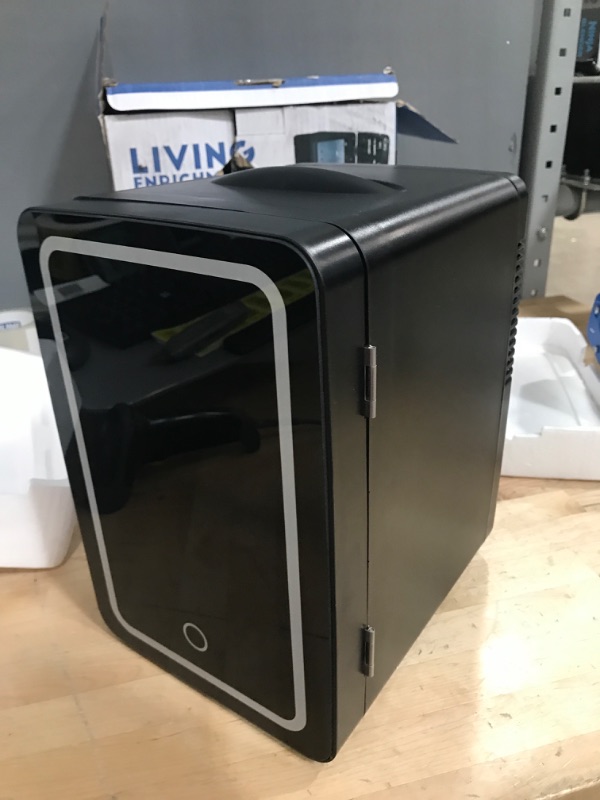 Photo 2 of **FOR PARTS ONLY**
Living Enrichment Mini Fridge 6L Capacity, Portable Small Refrigerator Cooler or Warmer, AC DC Powered, Skincare Fridge with Mirror Door, for Food, Cosmetics, Home, Office and Car - Black