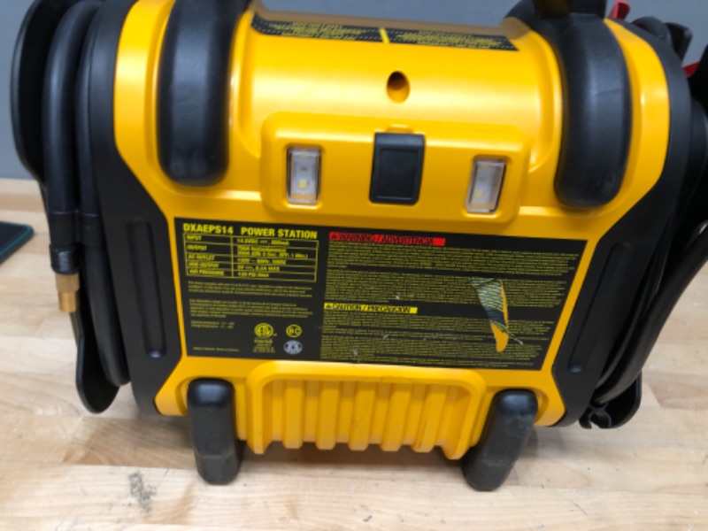 Photo 2 of DEWALT DXAEPS14 1600 Peak Battery Amp 12V Automotive Jump Starter/Power Station with 500 Watt AC Power Inverter, 120 PSI Digital Compressor, and USB Power , Yellow