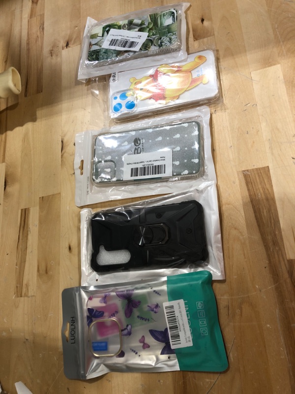 Photo 1 of 5 items, assorted phone case bundle