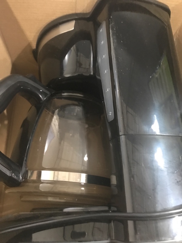 Photo 2 of ***HEAVILY USED AND DIRTY***
Black+Decker CM1160B 12-Cup Programmable Coffee Maker, Black/Stainless Steel