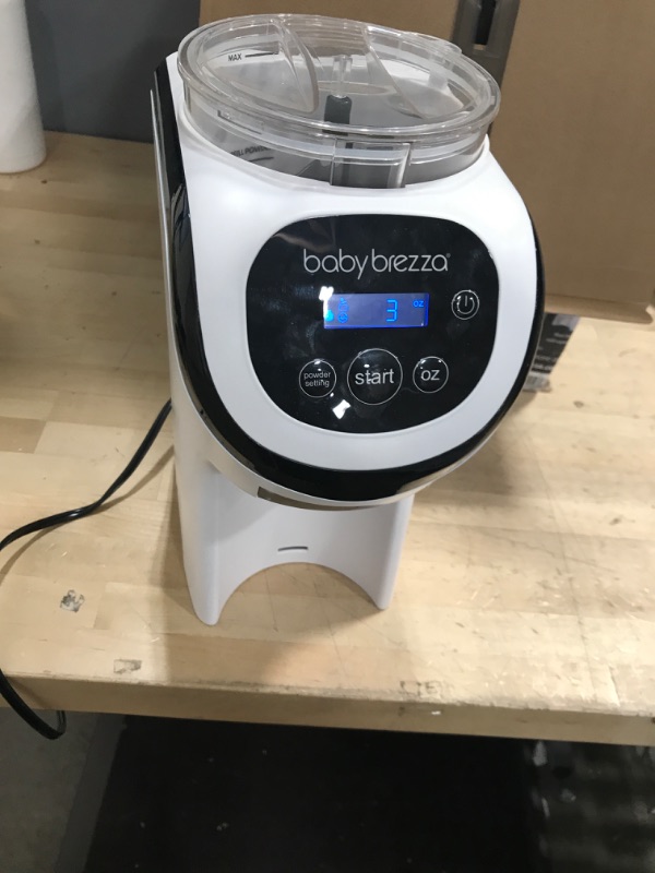 Photo 2 of Baby Brezza Formula Pro Mini Baby Formula Maker – Small Baby Formula Mixer Machine Fits Small Spaces and is Portable for Travel– Bottle Makers Makes The Perfect Bottle for Your Infant On The Go Formula Pro Mini Dispenser Machine