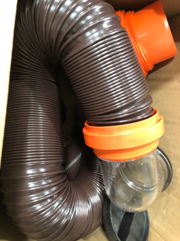 Photo 2 of Camco RhinoFLEX RV Sewer Hose Kit with Swivel Transparent Elbow and 4-in-1 Dump Station Fitting, Brown, 15 Feet (39770) 15ft Sewer Hose Kit Frustration-Free Packaging