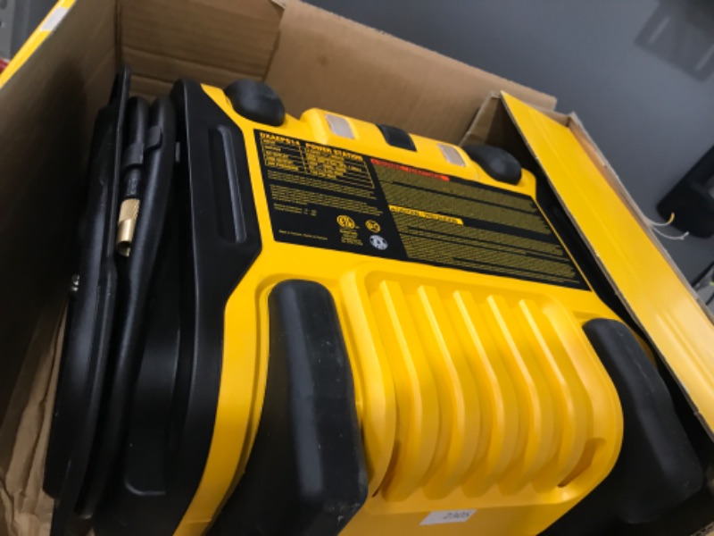 Photo 2 of DEWALT DXAEPS14 1600 Peak Battery Amp 12V Automotive Jump Starter/Power Station with 500 Watt AC Power Inverter, 120 PSI Digital Compressor, and USB Power , Yellow