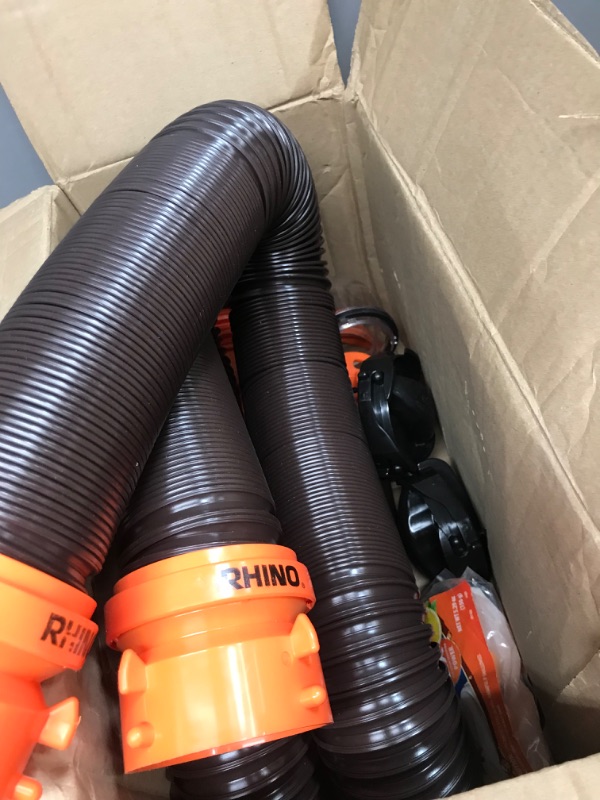 Photo 2 of Camco 20' (39742) RhinoFLEX 20-Foot RV Sewer Hose Kit, Swivel Transparent Elbow with 4-in-1 Dump Station Fitting-Storage Caps Included , Black , Brown 20ft Sewer Hose Kit Frustration-Free Packaging