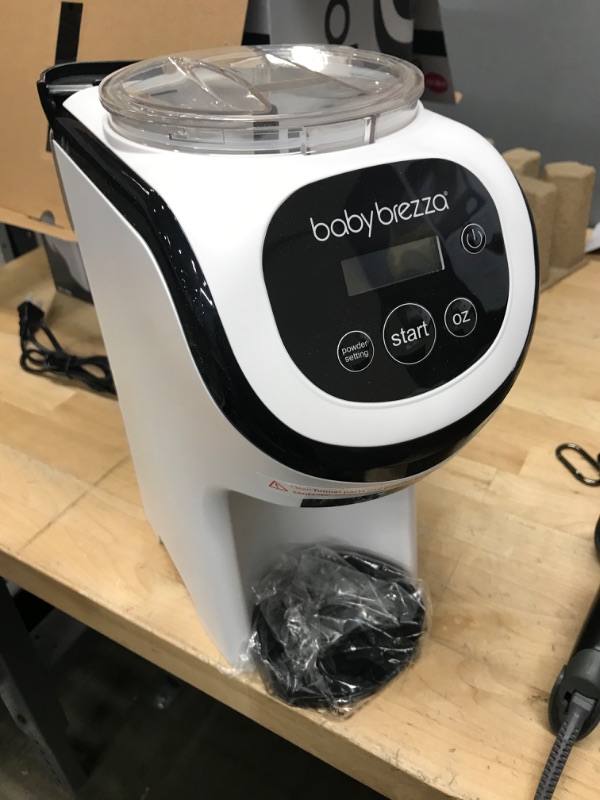 Photo 2 of Baby Brezza Formula Pro Mini Baby Formula Maker – Small Baby Formula Mixer Machine Fits Small Spaces and is Portable for Travel– Bottle Makers Makes The Perfect Bottle for Your Infant On The Go Formula Pro Mini Dispenser Machine