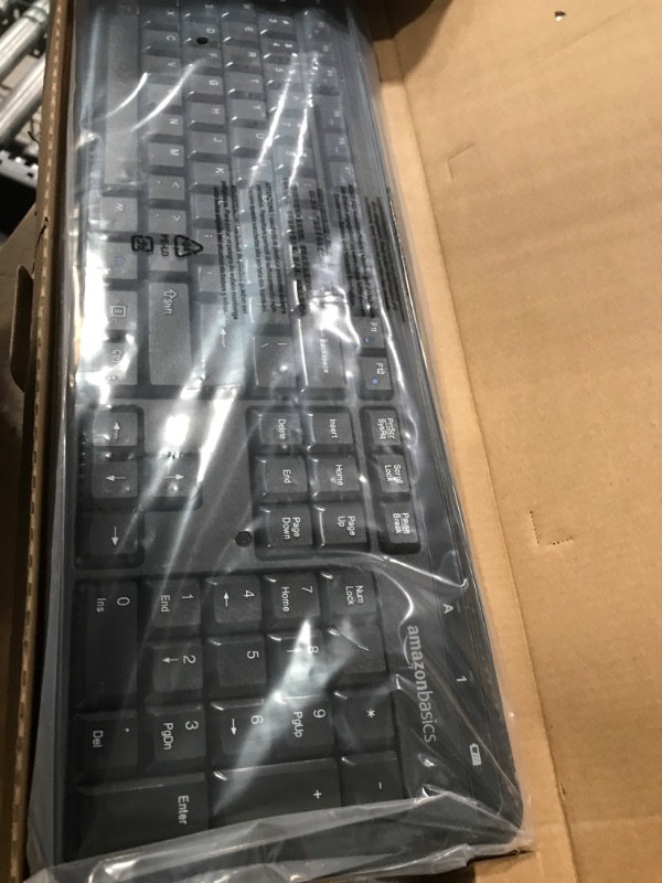 Photo 2 of Amazon Basics Wireless Computer Keyboard and Mouse Combo - Quiet and Compact - US Layout (QWERTY)