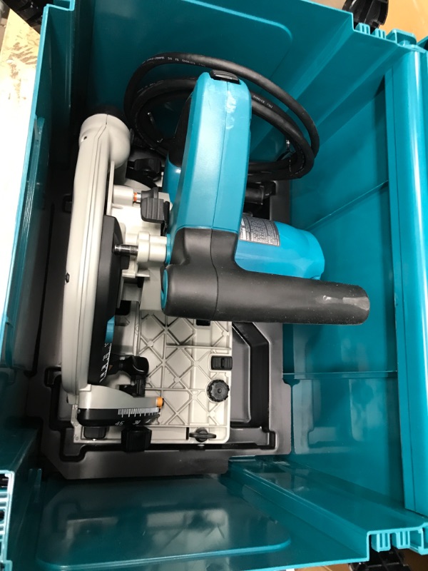 Photo 1 of *PLUGGED INTO POWER OUTLET , TESTED, AND FUNCTIONAL**MISSING BOX 2 OF 2(GUIDE RAIL)*
Makita SP6000J1 6-1/2-Inch 12.0 Amp Plunge Circular Saw with Guide Rail