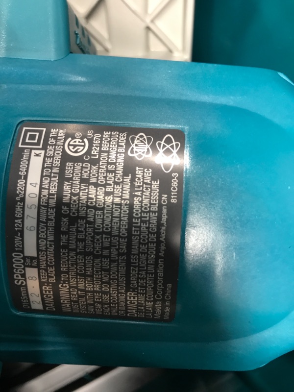 Photo 4 of *PLUGGED INTO POWER OUTLET , TESTED, AND FUNCTIONAL**MISSING BOX 2 OF 2(GUIDE RAIL)*
Makita SP6000J1 6-1/2-Inch 12.0 Amp Plunge Circular Saw with Guide Rail