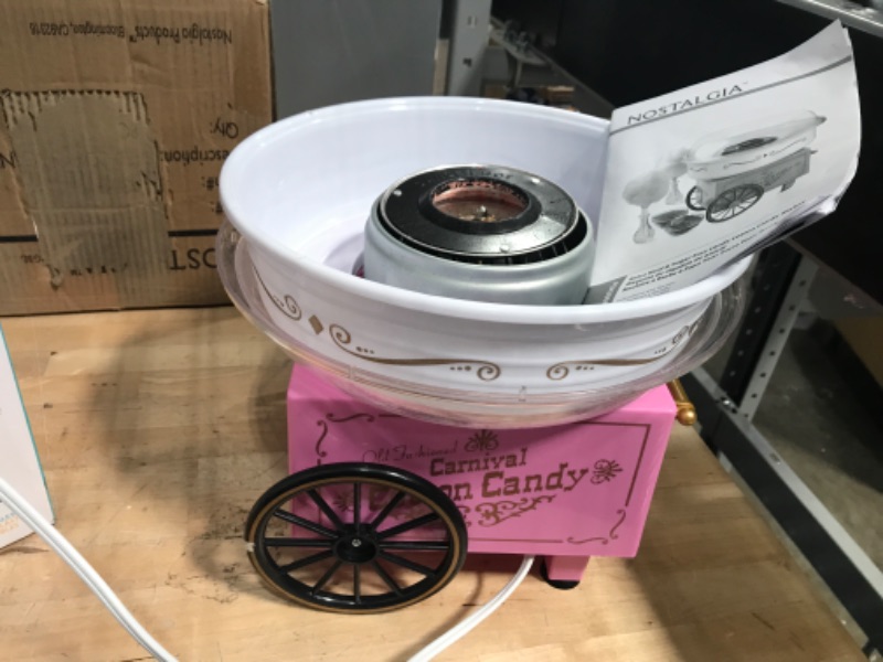 Photo 2 of **PARTS ONLY**
Nostalgia Retro Countertop Cotton Candy Machine, Vintage Candy Maker Includes 2 Reusable Cones & Scoop, Pink