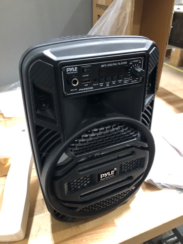 Photo 4 of missing power cord & unable to test.
Portable Bluetooth PA Speaker System - 300W Rechargeable Outdoor Bluetooth Speaker Portable PA System w/ 8” Subwoofer 1” Tweeter, Microphone In, Party Lights, MP3/USB, Radio, Remote - Pyle PPHP835B