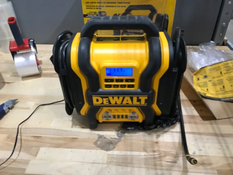 Photo 2 of DEWALT DXAEPS14 1600 Peak Battery Amp 12V Automotive Jump Starter/Power Station with 500 Watt AC Power Inverter, 120 PSI Digital Compressor, and USB Power , Yellow