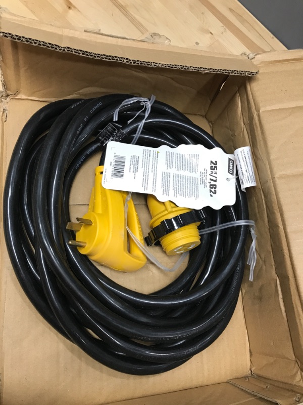 Photo 2 of Camco 25' PowerGrip Extension Cord with 30M/30F- Straight Locking Adapter | Allows for Easy RV Connection to Distant Power Outlets | Built to Last (55501), Black and yellow