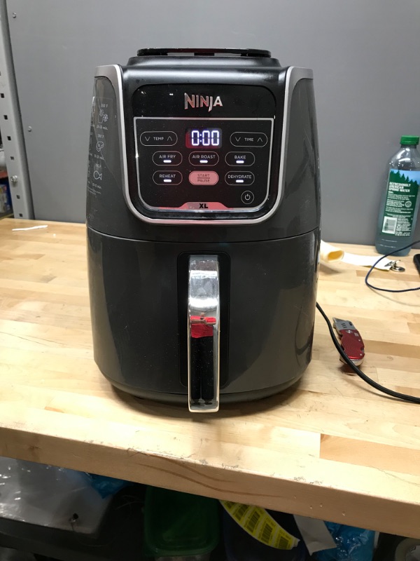 Photo 2 of 
Ninja AF150AMZ Air Fryer XL, 5.5 Qt. Capacity that can Air Fry, Air Roast, Bake, Reheat & Dehydrate, with Dishwasher Safe, Nonstick Basket & Crisper...