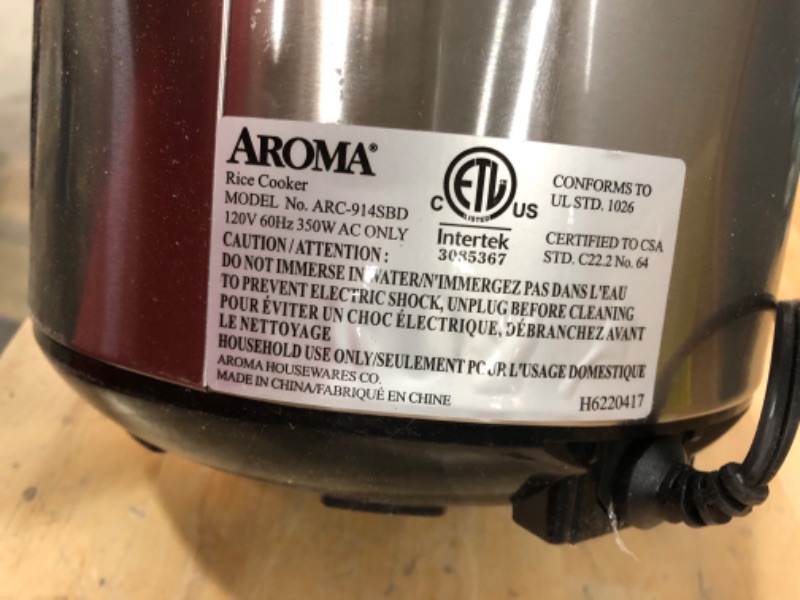 Photo 3 of ***USED DENTED*** TESTED FUNCTIONAL***

Aroma Housewares ARC-914SBD Digital Cool-Touch Rice Grain Cooker and Food Steamer, Stainless, Silver, 4-Cup (Uncooked) / 8-Cup (Cooked) Basic