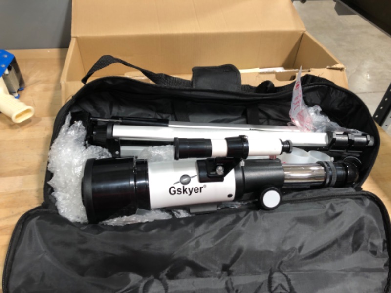 Photo 2 of ***OPEN BOX MAY BE MISSING HARDWARE**
Gskyer Telescope, 70mm Aperture 400mm AZ Mount Astronomical Refracting Telescope for Kids Beginners - Travel Telescope with Carry Bag, Phone Adapter and Wireless Remote
