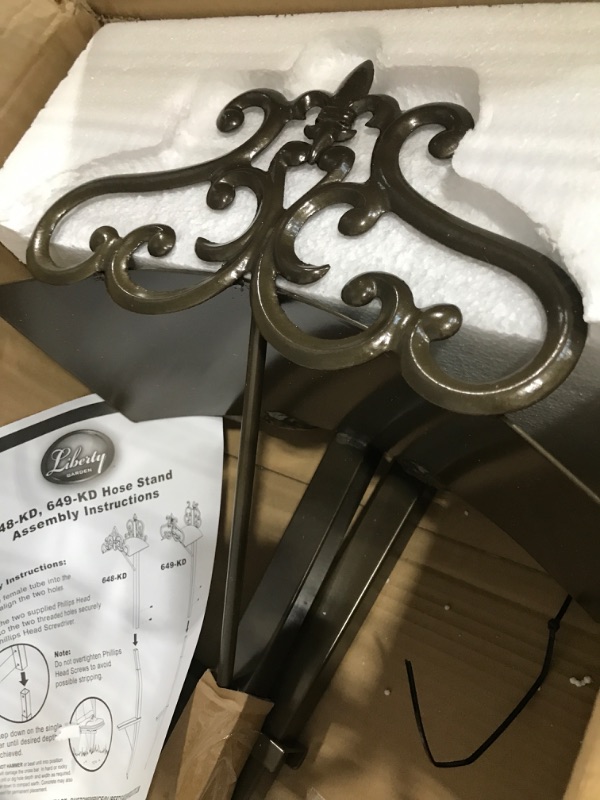 Photo 3 of ****USED** OPEN BOX MAY BE MISSING HARDWARE***
Liberty Garden LBG-649-KD Steel Decorative Garden Hose Stand with Hyde Park Design for Backyard, Garden, or Home in Bronze