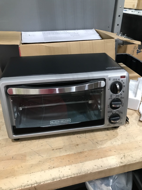 Photo 4 of ****NEW**** TESTED***

BLACK+DECKER 4-Slice Convection Oven, Stainless Steel, Curved Interior fits a 9 inch Pizza, TO1313SBD silver