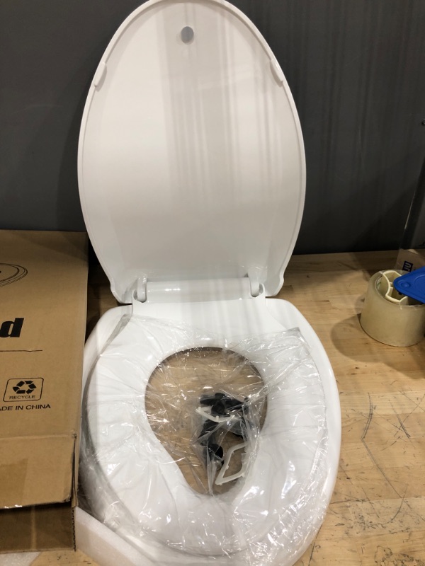 Photo 4 of ***USED FAIRLY NEW ***OPEN BOX MAY BE MISSING HARDWARE*****

Toilet Seat with Toddler Seat Built in, Potty Training Toilet Seat for Kids, Magnetic Kids Toilet Seat, Slow Close, Thicken Plastic Easy to Clean, Removable and Never Loosen, White(18.5”Elongate