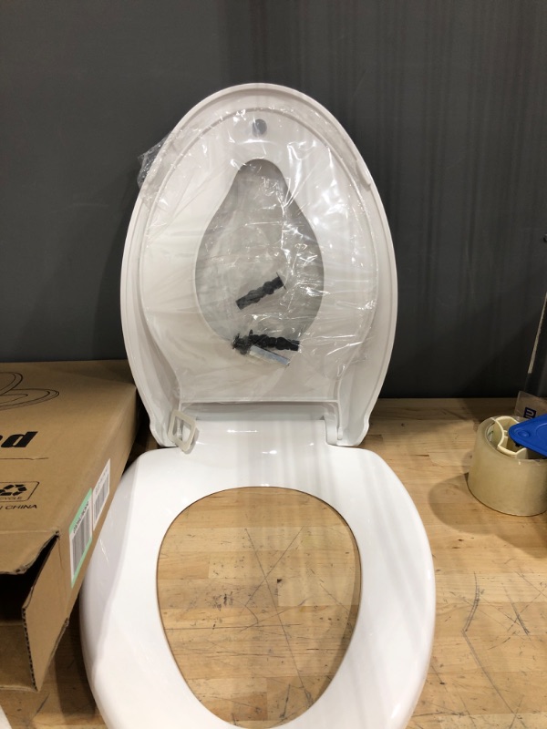 Photo 2 of ***USED FAIRLY NEW ***OPEN BOX MAY BE MISSING HARDWARE*****

Toilet Seat with Toddler Seat Built in, Potty Training Toilet Seat for Kids, Magnetic Kids Toilet Seat, Slow Close, Thicken Plastic Easy to Clean, Removable and Never Loosen, White(18.5”Elongate