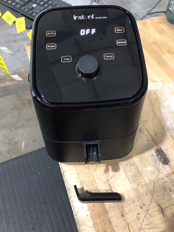 Photo 2 of ****NEW ***BROKEN HANDLE *** SEE PHOTOS*** DAMAGED***

Instant Vortex 4-in-1, 2-QT Mini Air Fryer Oven Combo, From the Makers of Instant Pot with Customizable Smart Cooking Programs, Nonstick and Dishwasher-Safe Basket, App with over 100 Recipes, Black