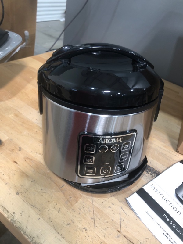 Photo 6 of ****PARTS ONLY NONFUNCTIONAL***** DAMAGE***
Aroma Housewares ARC-914SBD Digital Cool-Touch Rice Grain Cooker and Food Steamer, Stainless, Silver, 4-Cup (Uncooked) / 8-Cup (Cooked) Basic