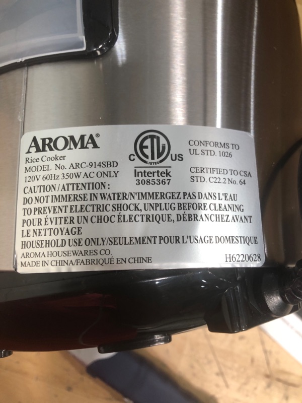 Photo 2 of ****PARTS ONLY NONFUNCTIONAL***** DAMAGE***
Aroma Housewares ARC-914SBD Digital Cool-Touch Rice Grain Cooker and Food Steamer, Stainless, Silver, 4-Cup (Uncooked) / 8-Cup (Cooked) Basic