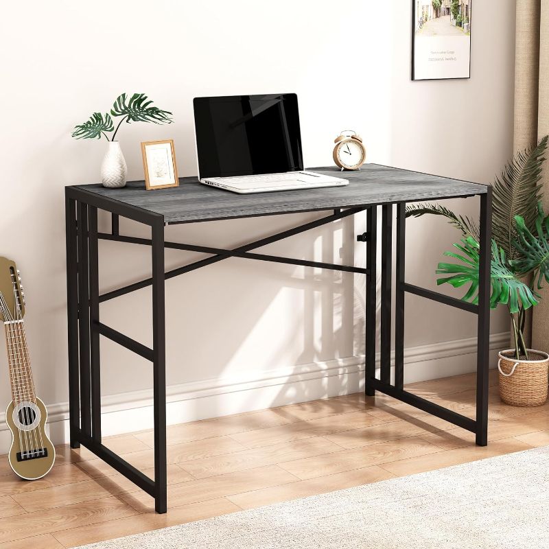 Photo 1 of HOBINCHE Folding Small Computer Desk, Foldable Space-Saving Home Office Table, Simple Study Writing Gaming Workstation for Small Space, No Assembly Needed, Oak
