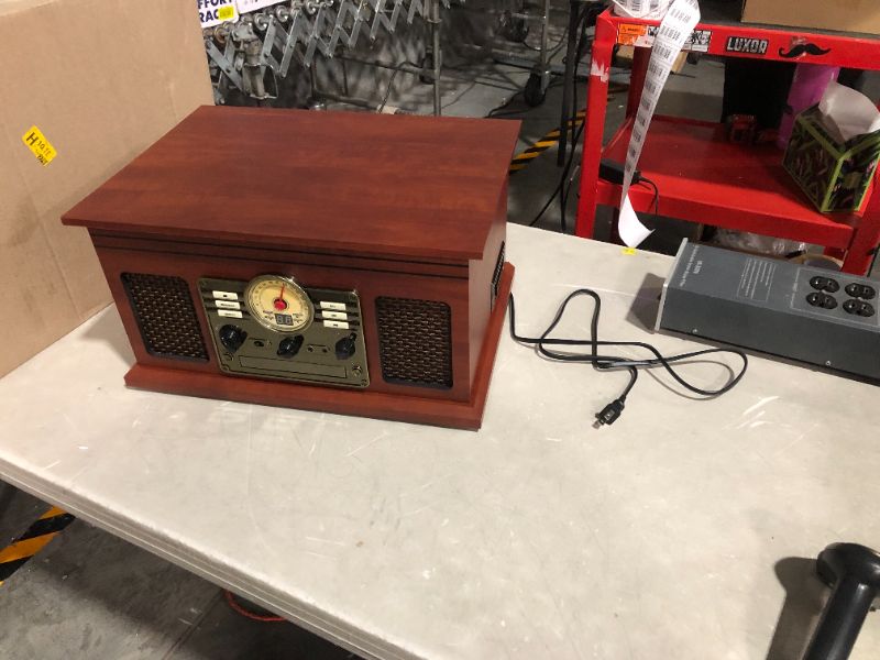 Photo 2 of ***DOES NOT POWER ON - UNABLE TO TROUBLESHOOT***
Victrola Nostalgic 6-in-1 Bluetooth Record Player & Multimedia Center with Built-in Speakers Mahogany