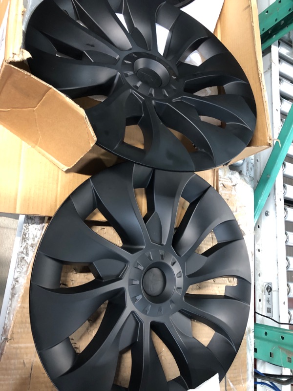 Photo 1 of * see images for damage * 
Model Y Wheel Covers/Hubcaps 20 Inch 