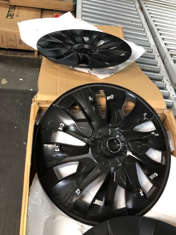 Photo 1 of * see images for damage * 
Model Y Wheel Covers/Hubcaps 20 Inch 