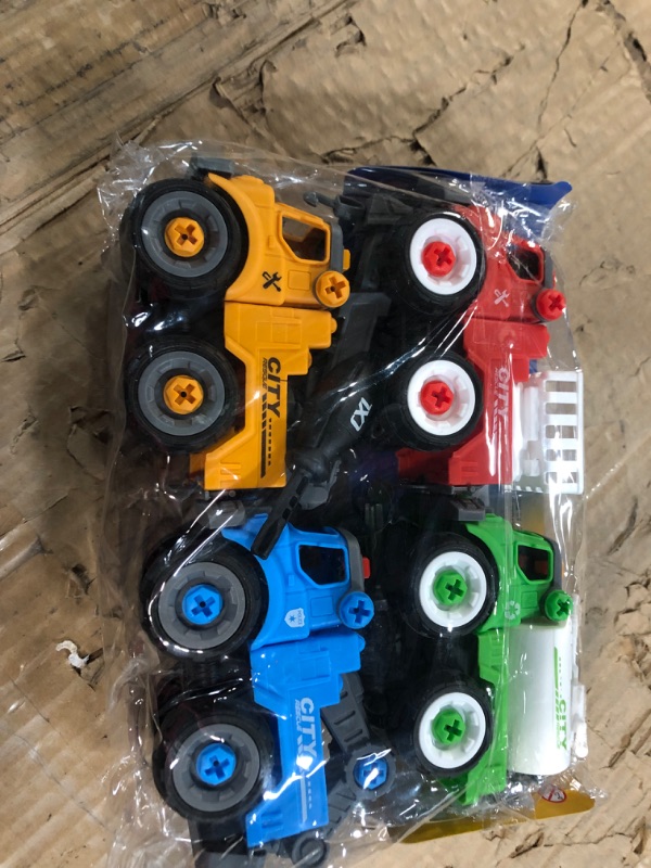 Photo 2 of Aigitoy Take Apart Toy with Screwdriver and Screws- 4 Pack Truck Set