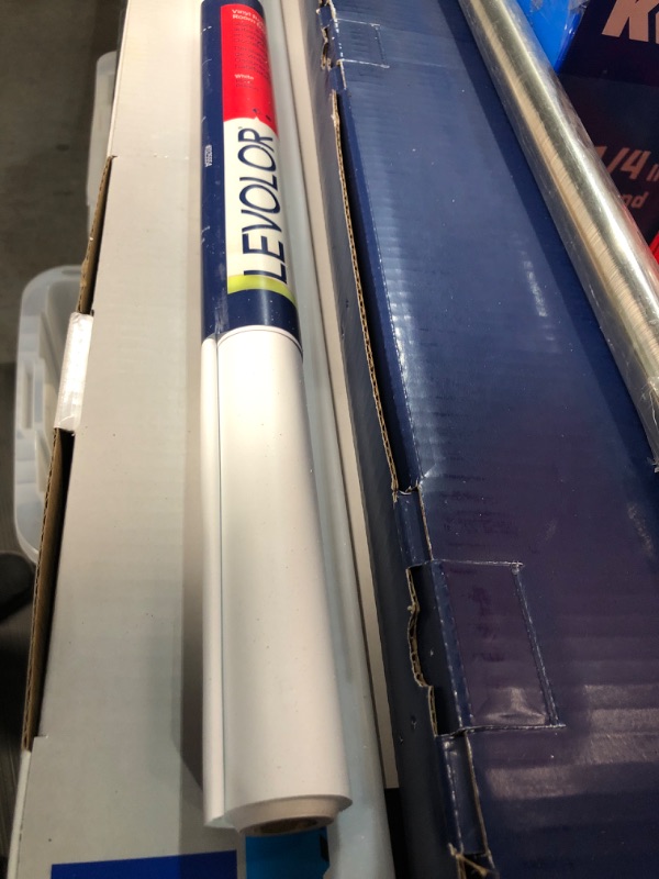 Photo 2 of **HAS BEEN USED- HAS BEEN CUT**
37" x 78" White Room Darkening Cordless Vinyl Roller Window Shade