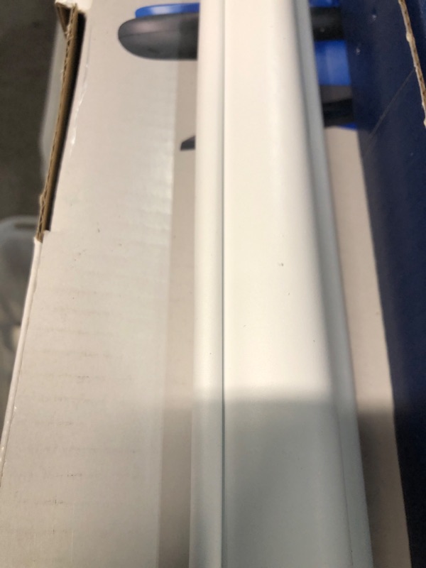 Photo 3 of **HAS BEEN USED- HAS BEEN CUT**
37" x 78" White Room Darkening Cordless Vinyl Roller Window Shade