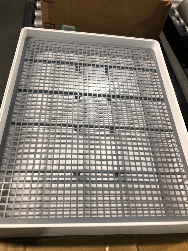 Photo 1 of **USED-UNKOWN DIMENSIONS**
Oncpcare Guinea Pig Litter Pan with Grate, 