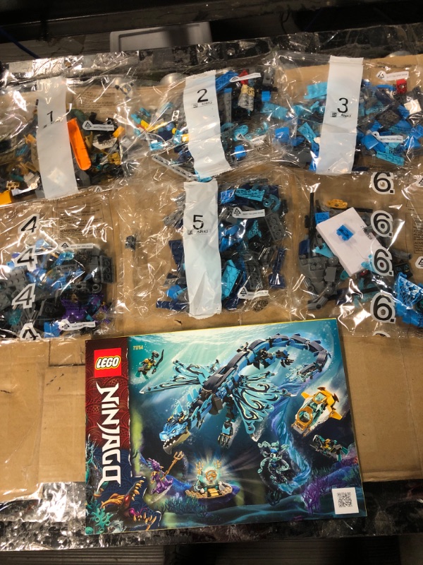 Photo 4 of **NEW OPEN FOR INSPECTION**
LEGO Ninjago Water Dragon 71754 Building Toy Set 