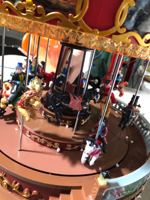 Photo 3 of 11" Red and White LED Lighted and Animated Christmas Carousel with Horses