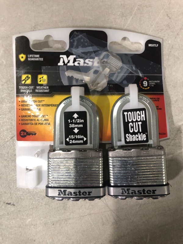 Photo 1 of 
Master Lock M5XTLF Magnum Heavy Duty Outdoor Padlock with Key, 2 Pack Keyed-Alike 2 Pack, Keyed-Alike