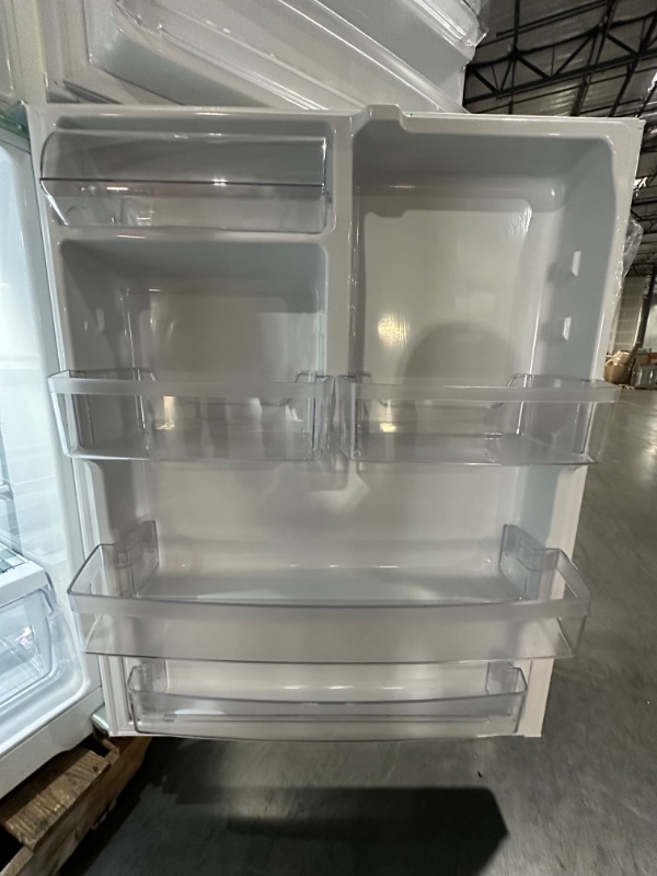 Photo 8 of GE Garage-ready 21.9-cu ft Top-Freezer Refrigerator (White)